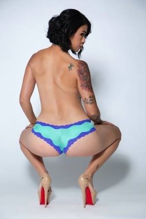 Asian MILF pornstar Dana Vespoli posing nude in high heels after panty doffing on galphoto.com