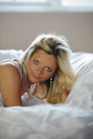Blonde model Zuzia shows her natural tits in white cotton panties on www.galphoto.com