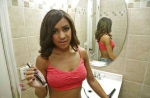 Amateur black babe Nicole flaunting big natural saggy tits in bathroom on galphoto.com