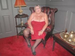 Obese grandmother Grandma Libby showcases her bald pussy in stockings on galphoto.com