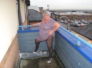 Fat UK nan Grandma Libby bares her tits on a balcony before getting butt naked - Britain on galphoto.com