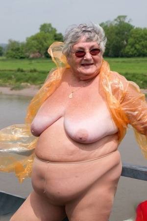 Obese British amateur Grandma Libby casts off a see-through raincoat - Britain on www.galphoto.com