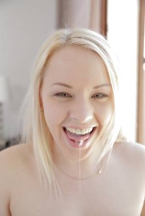 Tattooed blonde Lola Taylor taking cum in mouth after blowing big cock on galphoto.com