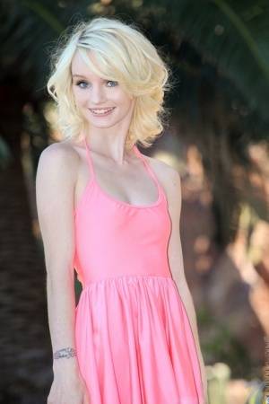 Tiny titted skinny teen Sammie Daniels doffs short dress to pose naked outside on galphoto.com