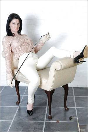 Seductive fetish lady posing in sheer blouse and white tights on galphoto.com