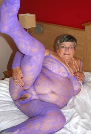 British fatty Grandma Libby masturbates on a bed in a crotchless bodystocking - Britain on galphoto.com