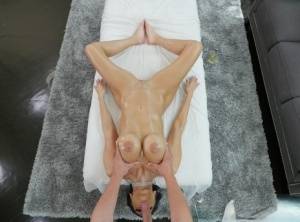 Big titted chick Veronica Rayne sucks her masseurs dick while getting massaged on galphoto.com