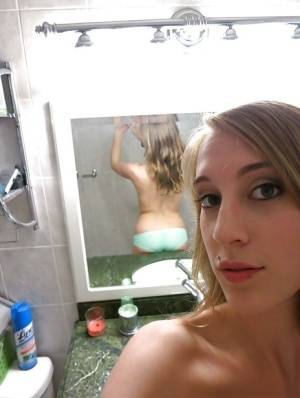 Smiley amateur Cadence Lux stripping and picturing herself in the bath on galphoto.com