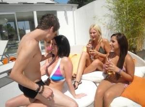 Young girls in bikinis takes turns sucking and fucking a solitary cock on galphoto.com
