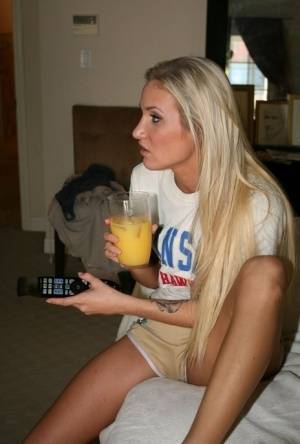 Blond ex-gf Addison Cain undresses and masturbates after having her morning OJ on galphoto.com