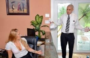 Clothed office worker unveiling big tits while fucking co-worker on galphoto.com