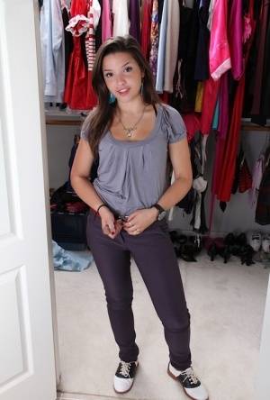 Sweet teenage amateur undressing and spreading her legs in changing room on www.galphoto.com