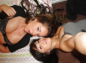 Teen lesbians April Oneil and Ella Milano humping and undressing each other on galphoto.com