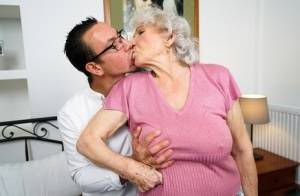 Old woman Norma B has her hairy muff licked before being banged by her toy boy on galphoto.com